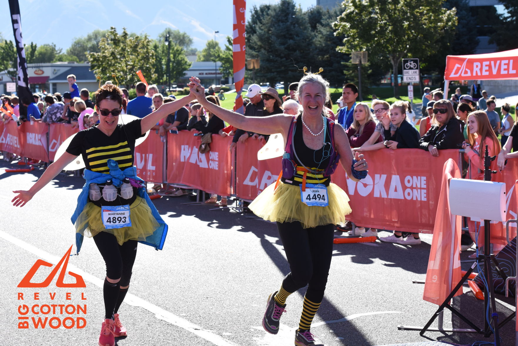 Donning bumblebee costumes, Reed (left) and Chester run in the Big Cottonwood Canyon half-marathon in Utah.